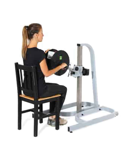 A woman is using an APT device for exercise.