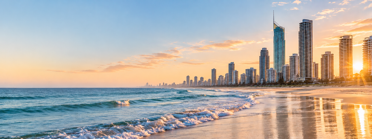 Gold Coast beach and Surfers Paradise skyline at sunset